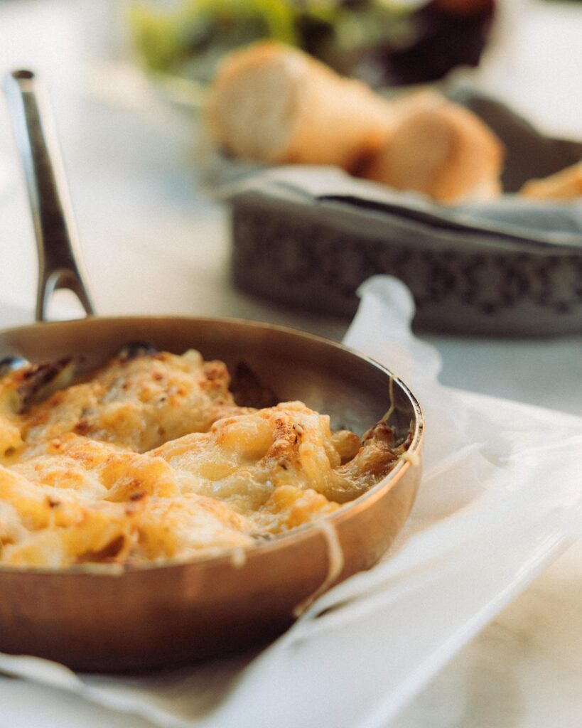 Photo by Anh Nguyen: https://www.pexels.com/photo/delicious-cheese-pasta-in-copper-pan-32710318/
